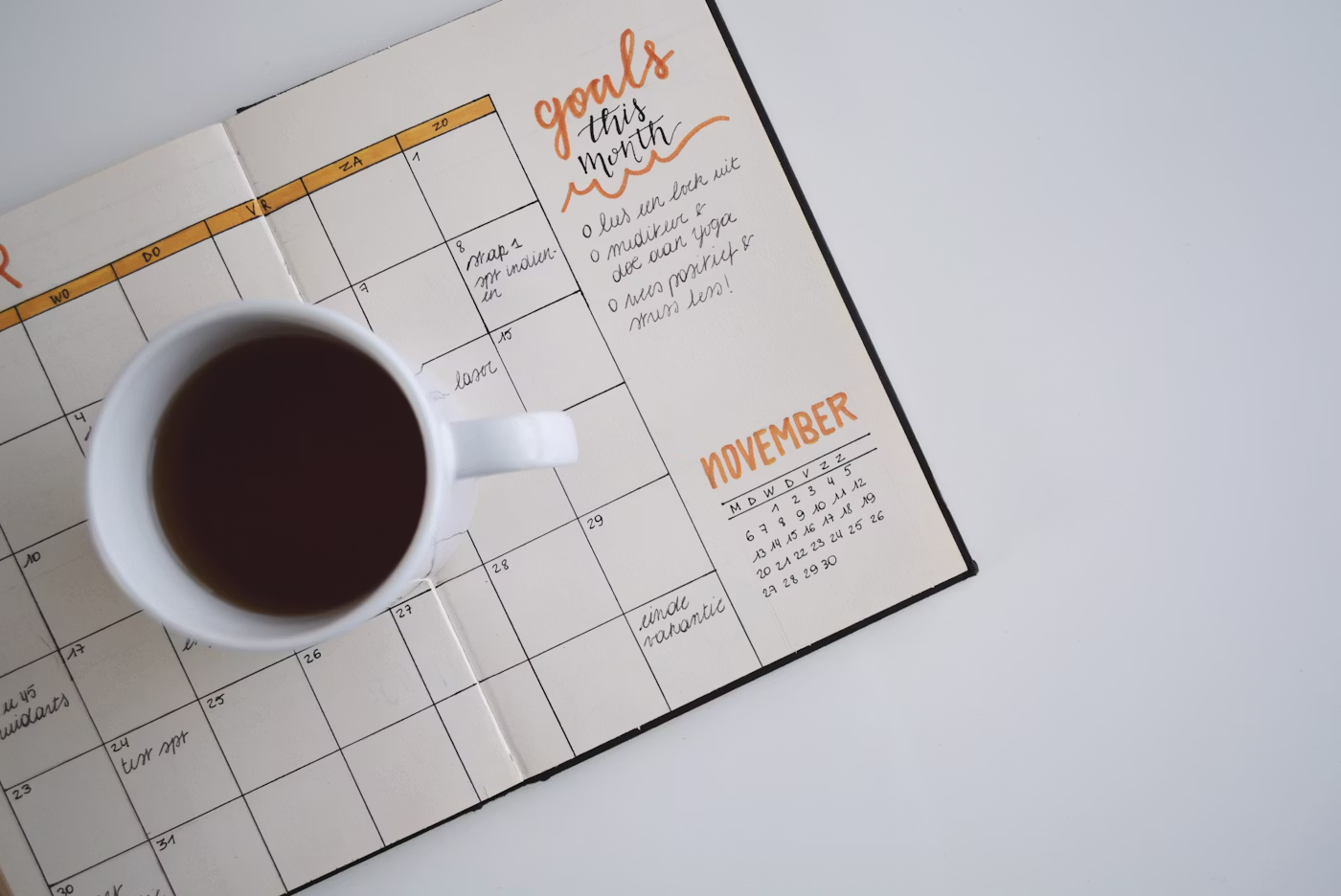 Calendar and clock on a clean desk representing flexible scheduling for professional treatment